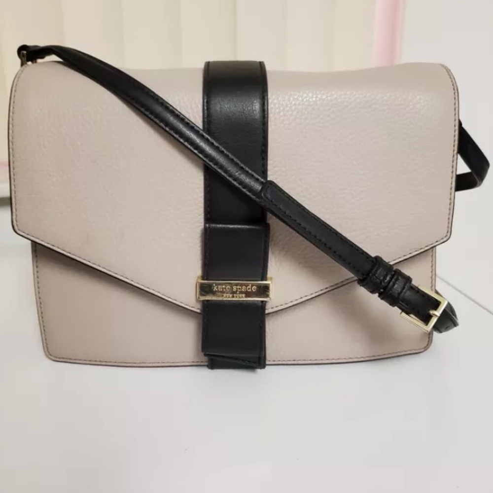 Kate Spade  gray pebble leather  with black trim